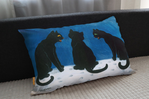 Poduszka Czarne koty na śniegu Louis Wain