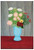 Still life of flowers in a blue vase