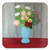 Still life of flowers in a blue vase