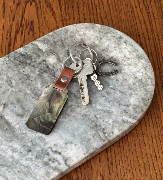 Brelok Julia przy stole Berthe Morisot