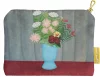 Still life of flowers in a blue vase