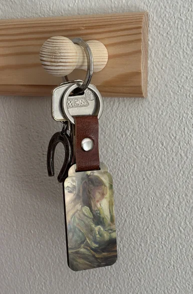 Brelok Julia przy stole Berthe Morisot