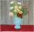 Still life of flowers in a blue vase