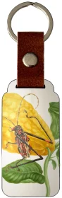 Brelok Cytryna z gąsienicą małpy i chrząszczem harlekin Maria Sibylla Merian