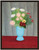 Still life of flowers in a blue vase
