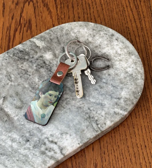 Brelok Kobieta na tle martwej natury, Cezanne Paul Gauguin